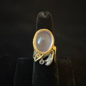 Handmade silver with gold accents rose quartz ring with two small amethysts